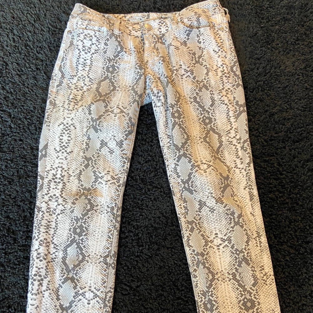 White Leopard print jeans.